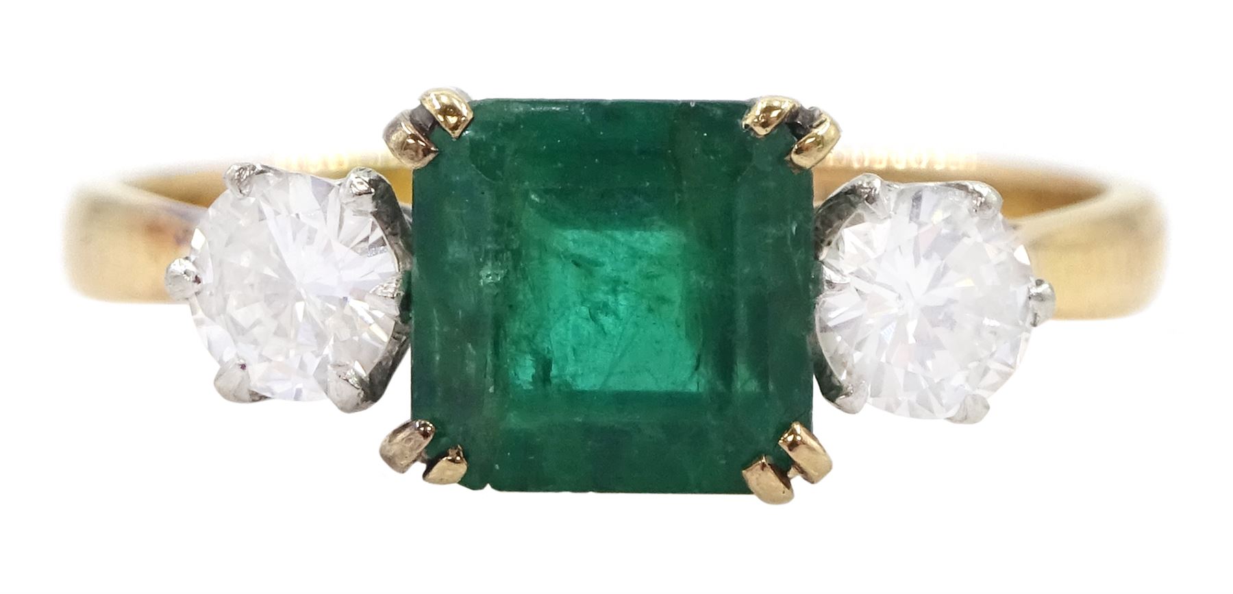 Gold three stone emerald and round brilliant cut diamond ring, stamped 18ct Plat, emerald approx 1.20 carat, total diamond weight approx 0.50 carat