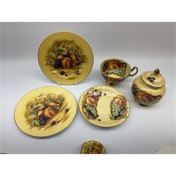 A collection of Aynsley Orchard Gold, comprising two plates, D26.5cm, square tray, D19cm, teacup and saucer, coffee can and saucer, two side plates, trinket dish, jar and cover, pot and cover, and pill box. 