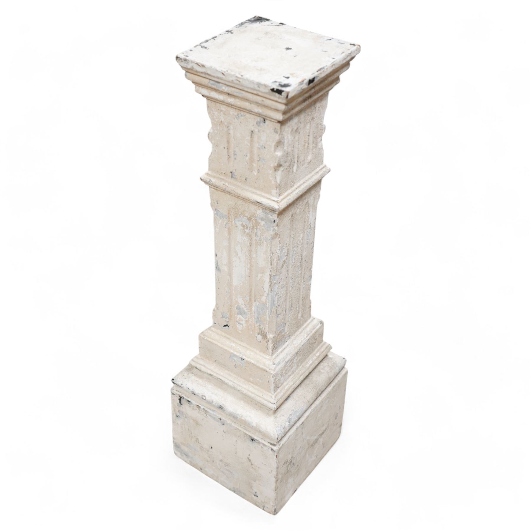 20th century painted wood pedestal, stepped square form with fluted decoration, terminating to moulded base, distressed white paint finish 