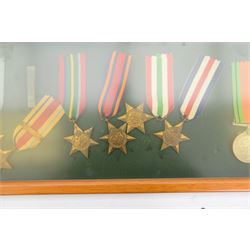 World War II medal group, comprising 1939-45 Star, Pacific Star, Burma Star, Italy Star, 
Atlantic Star, 1939-45 War medal and General Service medal, in glazed frame 