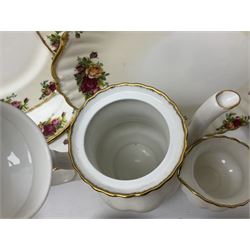 Royal Albert Old Country Roses pattern coffee set for four, comprising coffee pot, milk jug, cups and saucers, cake plate, together with six dinner plates, side plates etc (34) 