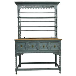 20th century painted oak dresser, projecting moulding cornice over pierced frieze and upright, moulded rectangular top over two drawers with geometric mouldings, on turned supports united by stretchers 