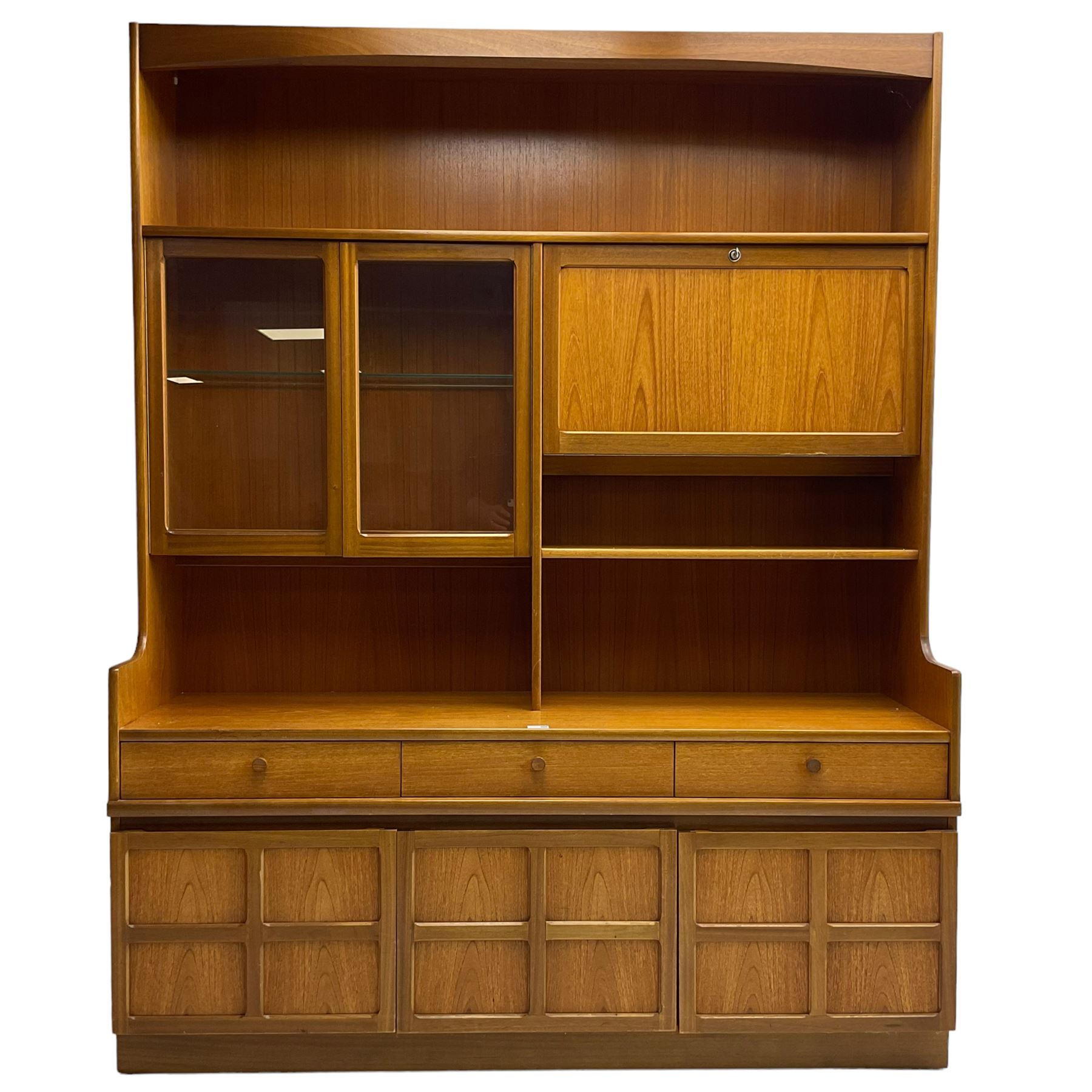 Nathan - teak wall unit, fitted with raised display cabinet and fall front compartment, three drawers and three cupboards below