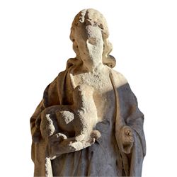 19th century weathered carved sandstone figure of Jesus Christ depicted as the Good Shepherd, draped in robes and holding a lamb, on a naturalistic base