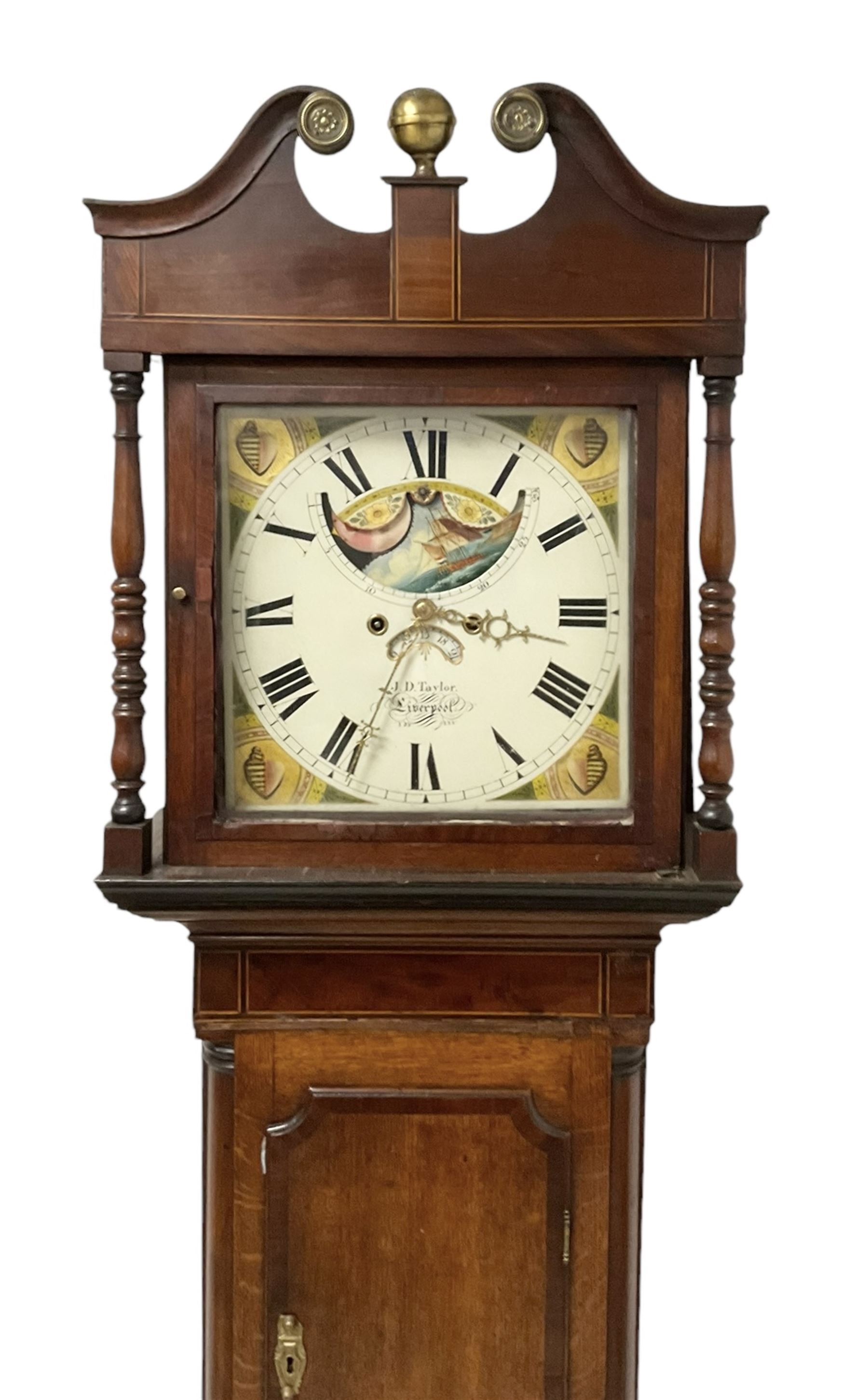 Taylor of Liverpool - mid 19th century 8-day Oak and Mahogany longcase clock with a swans necked pediment and brass ball finial, with a square hood door beneath flanked by turned pilasters, trunk with a short crossbanded door and raised panel on a square plinth raised on bracket feet, painted dial with matching geometric spandrels including depictions of conche shells, Roman numerals, makers name, axe moon disc and calendar aperture, dial pinned via a false plate to a rack striking movement, striking the hours on a bell. With weights and pendulum.