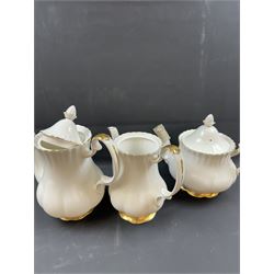 Royal Albert Val D'or part tea and dinner service, including two coffee pots, two teapots, milk jug, covered sucrier etc together with matching items 