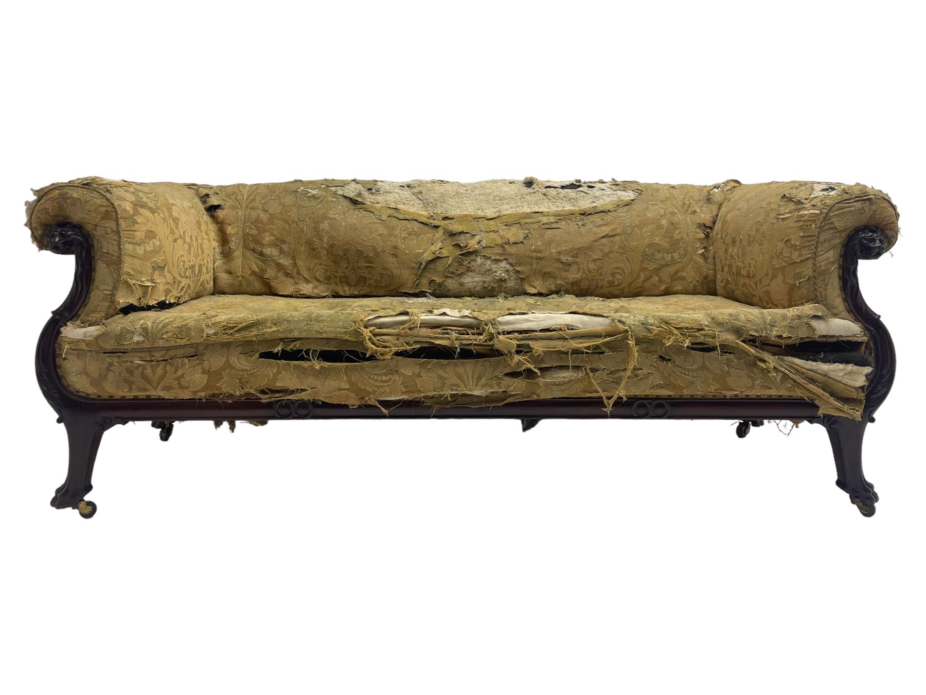 19th century mahogany settee, rolled S-scrolled arms carved with lion masks and acanthus leaf scrolls, the lower moulded rail carved with scrolling design, raised on carved paw feet with recessed brass and ceramic castors 