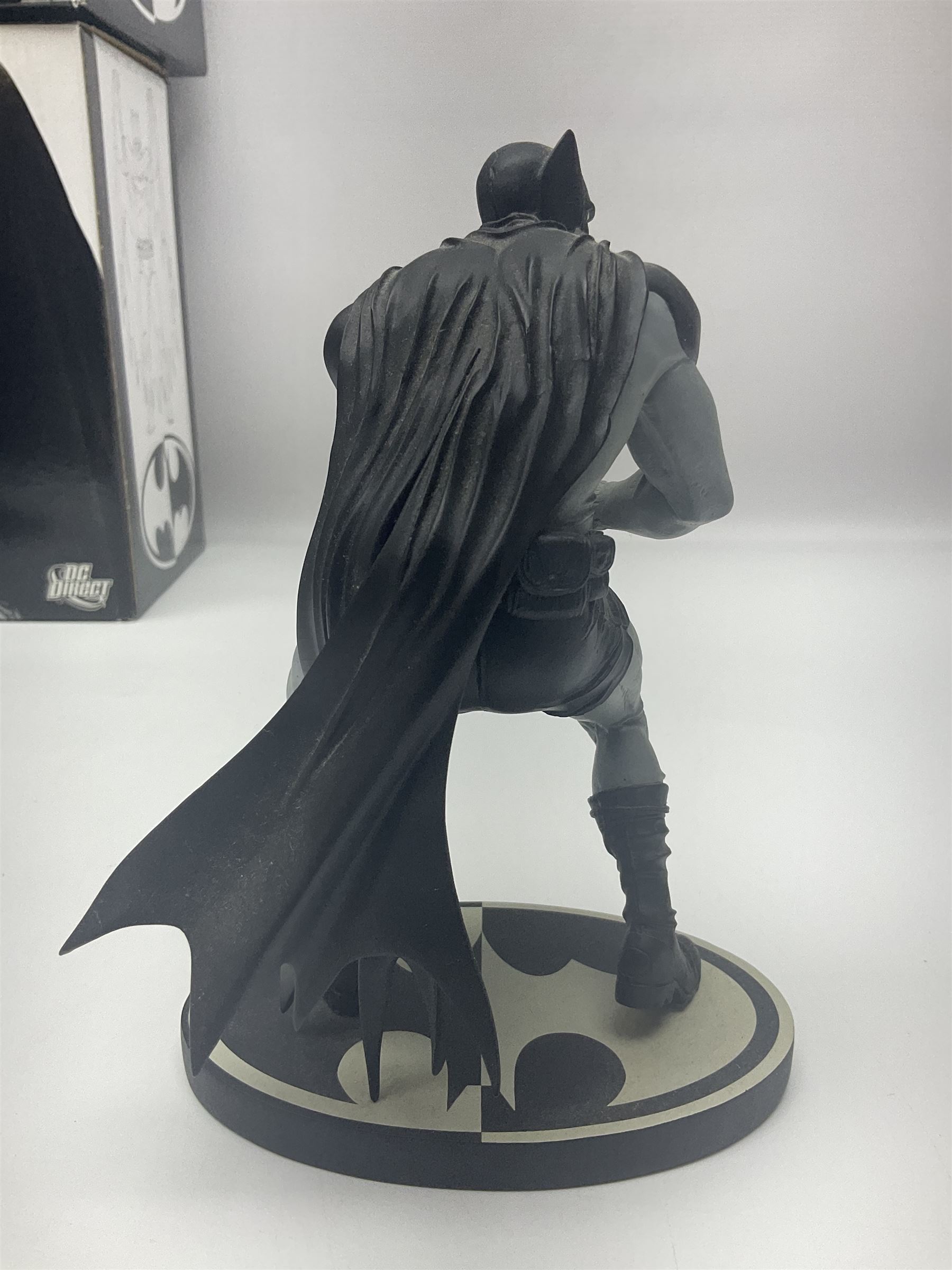 Group of five limited edition DC Direct Black and White Batman hand-painted cold-cast porcelain statues in original boxes, with two similar examples from DC Collectibles 