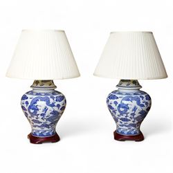 Pair of large table lamps of lidded baluster form, decorated with dragons chasing flaming ...