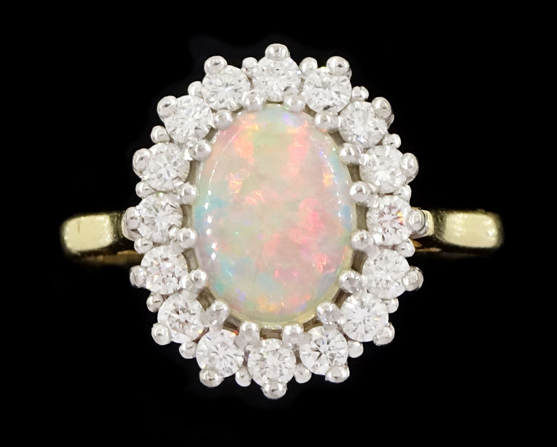 18ct gold opal and round brilliant cut diamond cluster ring, hallmarked, opal 0.66 carat, total diamond weight 0.36 carat