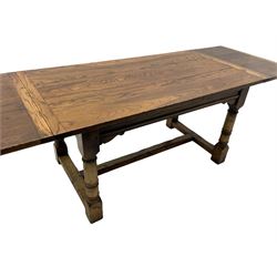 Oak refectory dining table, rectangular three plank top with cleated ends, two additional leaves, on turned supports united by H-stretchers 