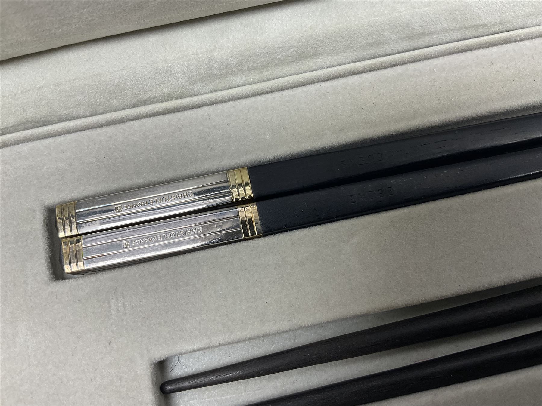 Set of eight silver plated ebony chopsticks by Christofle France, in presentation case