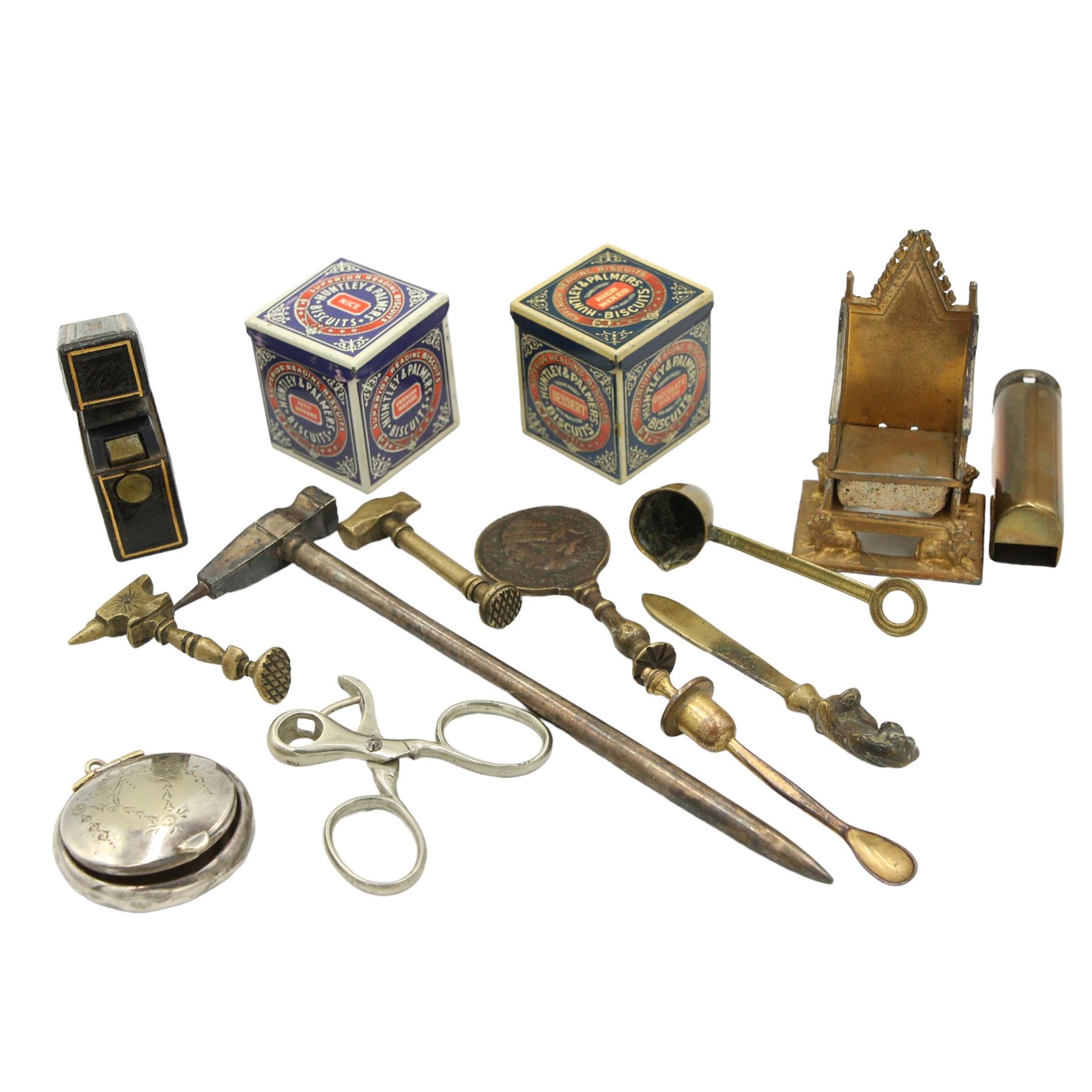 Two miniature Huntley & Palmers biscuit tins, tooled gilt and leather bound lighter, Edwardian silver-plated compact, three 19th century brass pipe tampers, with medallion, anvil and hammer handles, Britains coronation chair, etc 