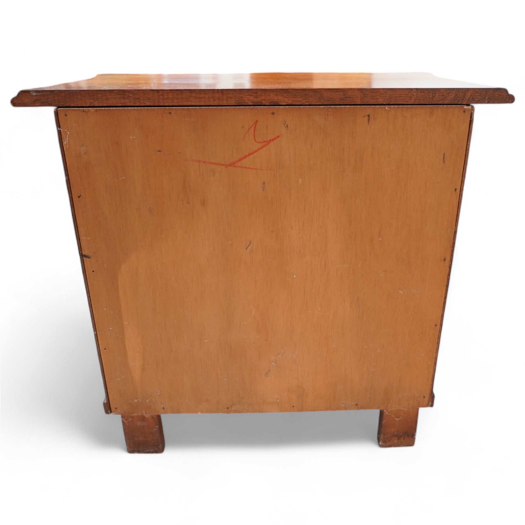 Early 20th century Dutch oak bombe chest, shaped rectangular top with moulded edge, fitted with three drawers flanked by moulded uprights, on hairy ball-and-claw feet