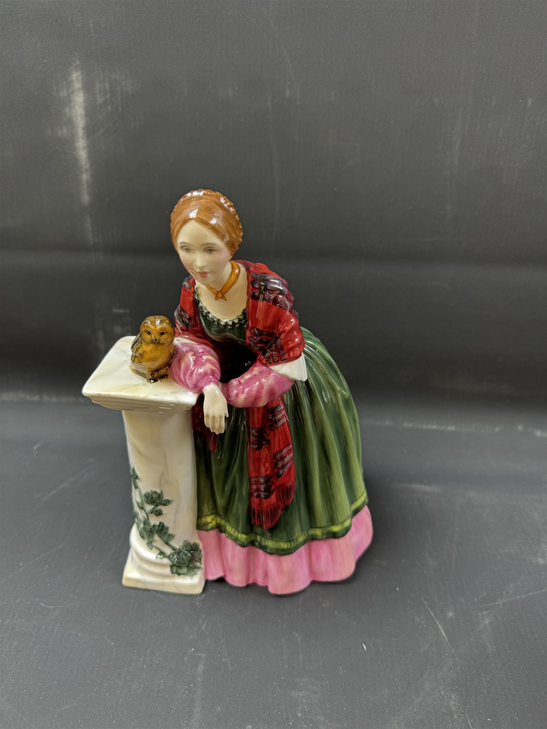 Four Royal Doulton figures, comprising Florence Nightingale HN3144, The Bedtime Story HN2059, Lady Charmain HN1949 and Sweet Anne HN1315 