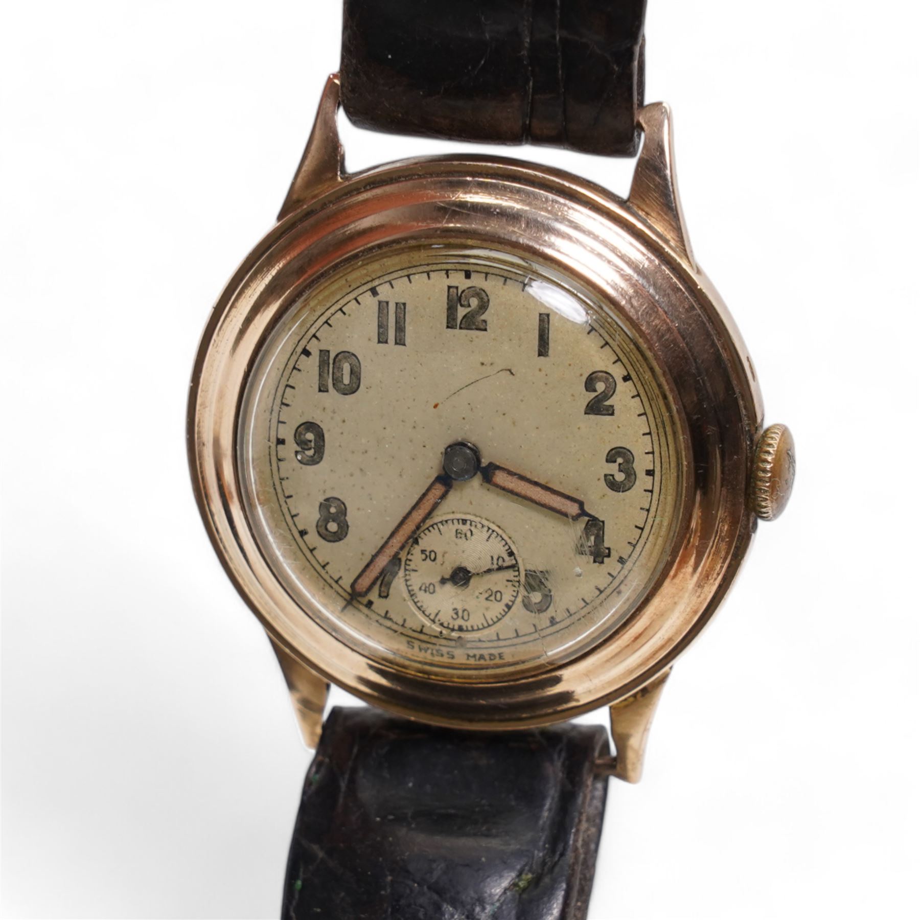 9ct rose gold manual wind wristwatch, silvered dial with Arabic numerals and subsidiary seconds dial, case by British Watch Cases Ltd, Edinburgh 1989, on a black leather strap