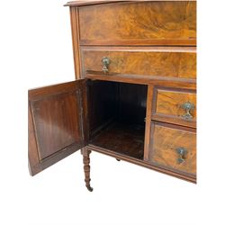 Edwardian walnut gentleman's tallboy, moulded hinged lid enclosing divisions, long drawer over two short drawers and panelled cupboard, turned supports terminating at ceramic castors