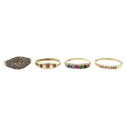 Four 9ct gold stone set rings including seven stone champagne diamond, garnet and multi gemstone set, three stone garnet ring and a diamond dome ring, all hallmarked