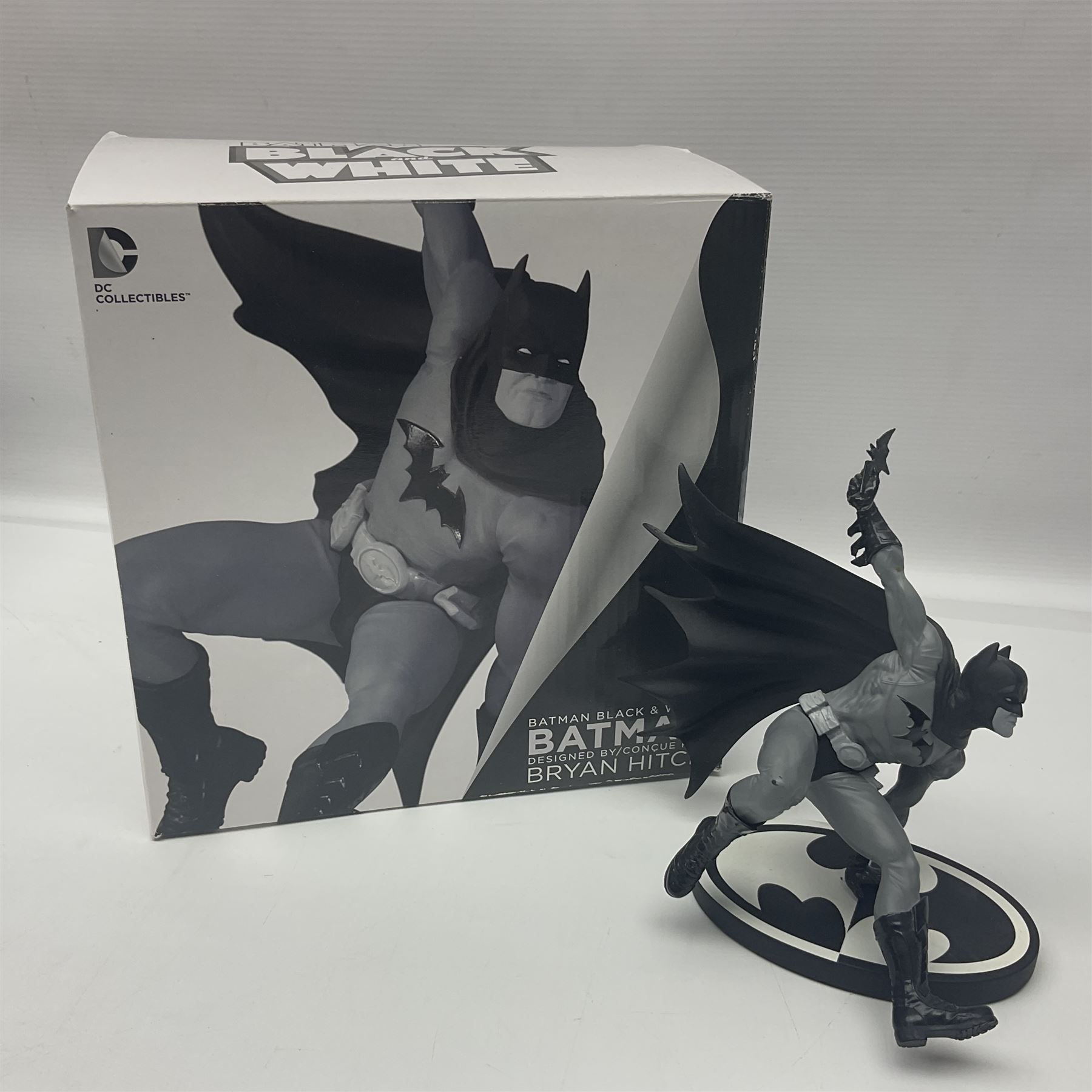 Group of five limited edition DC Direct Black and White Batman hand-painted cold-cast porcelain statues in original boxes, with two similar examples from DC Collectibles 