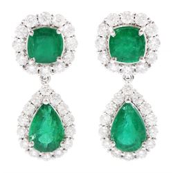 Pair of 18ct white gold emerald and round brilliant cut diamond pendant stud earrings, cushion cut emeralds with diamond surround, suspending a pear cut emerald and diamond cluster, stamped, total emerald weight approx 4.30 carat, total diamond weight approx 1.85 carat