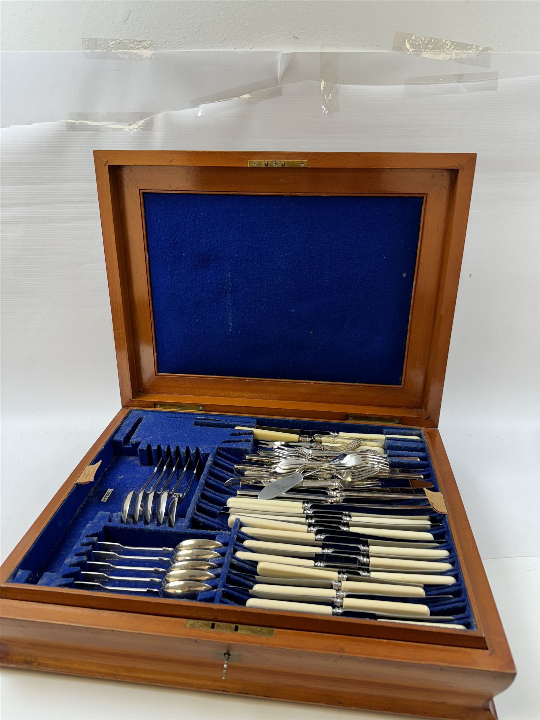 Early 20th century mahogany canteen box, containing selection of matched silver plated cutlery