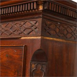 George III mahogany chest-on-chest, projecting dentil cornice over blind fretwork frieze, fitted with two short and six long cock-beaded drawers, ornately cast swan neck handles and circular beaded plates, on splayed ogee bracket feet 