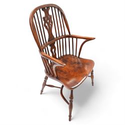 Ash and elm Windsor armchair, double hoop and stick back with shaped and pierced splat, dished saddle seat on turned supports united by crinoline stretcher 