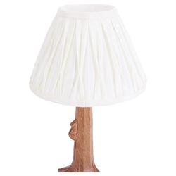 'Mouseman' tooled oak table lamp, tapered octagonal stem terminating to leaf carved square base, carved mouse signature, with pleated cream shade, by Robert Thompson of Kilburn