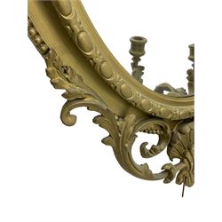 19th century giltwood and gesso girandole wall mirror, the raised pediment decorated with ribbon tie over curled acanthus leaves and flowerhead festoons, oval egg and dart moulded frame with outer bead, three projecting candle sconces in the form of scrolled acanthus leaves, lower shell motif with extending leaf decoration 