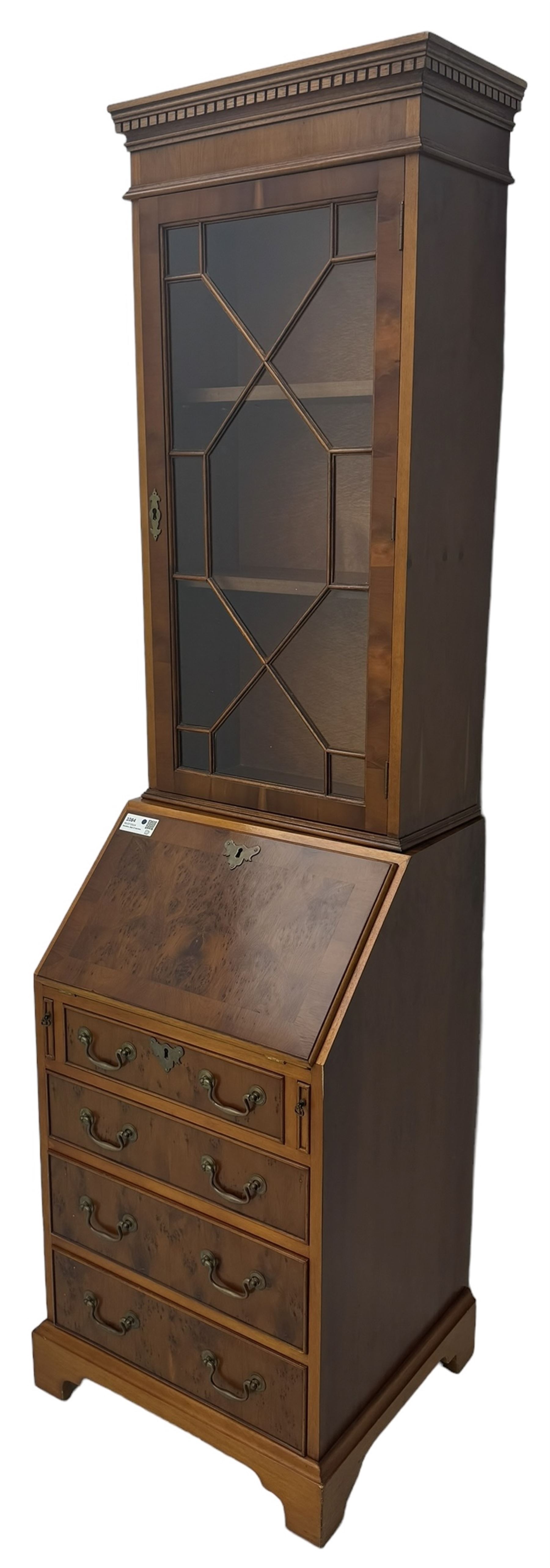 Mid-to-late 20th century yew wood bureau bookcase, raised bookcase enclosed by glazed door, the fall front revealing fitted interior, four graduating cock-beaded drawers below, on bracket feet