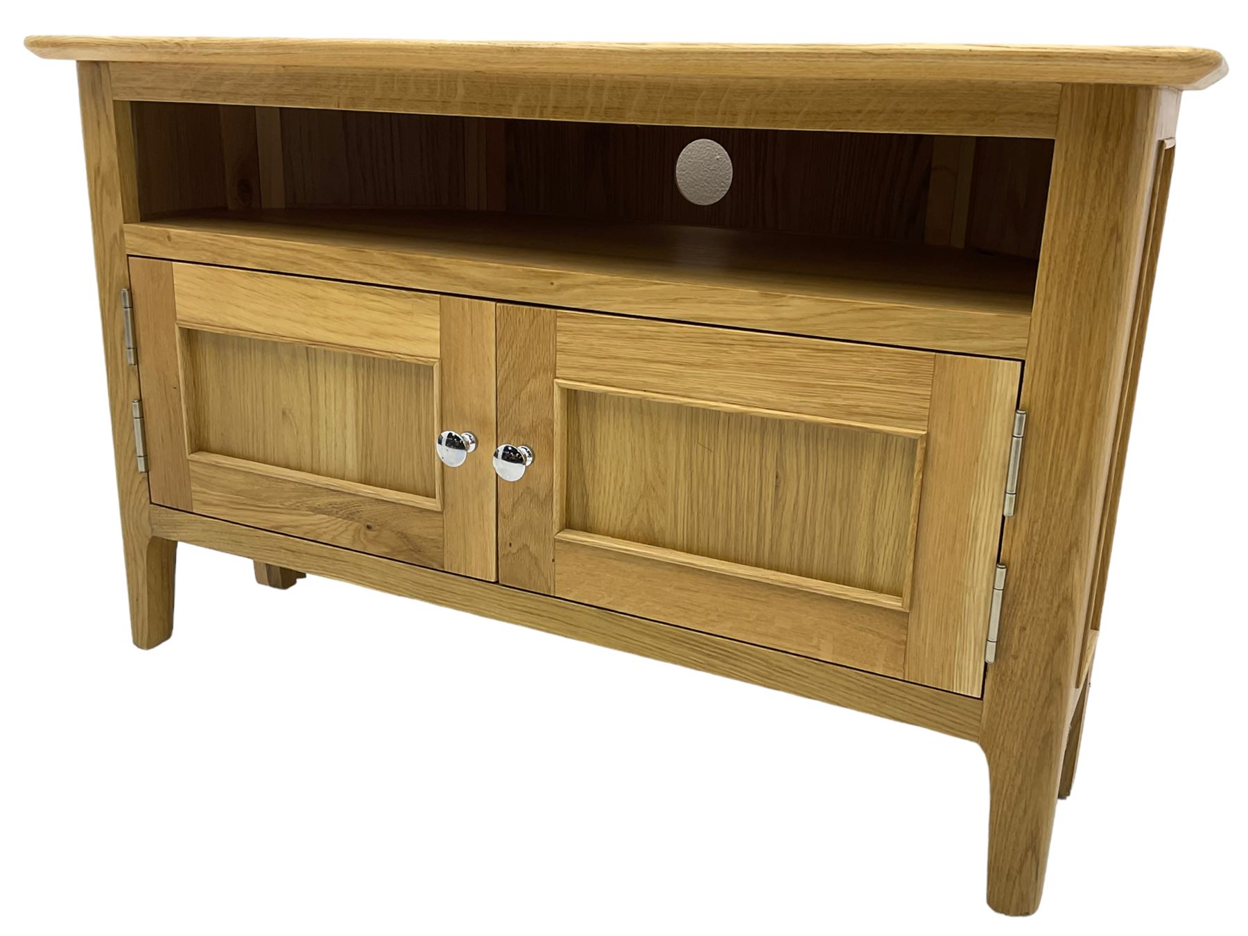 Contemporary light oak corner television stand, hexagonal top over recessed shelf, fitted with two panelled cupboard doors with chrome handles, on straight supports with rounded inner edges