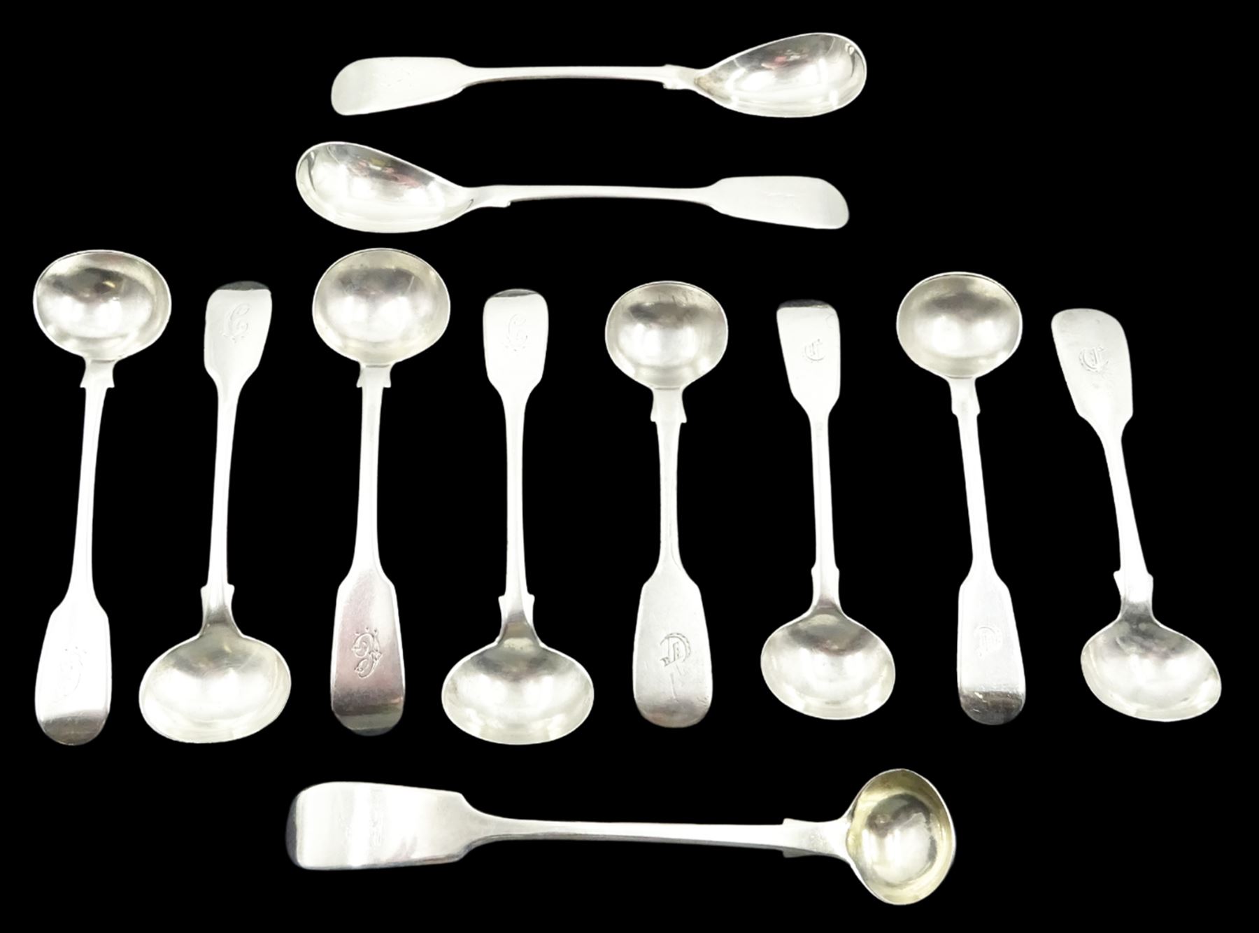 Collection of eleven silver Fiddle pattern salt spoons, comprising a matched set of four Victorian examples, hallmarked Thomas Sewell I, Newcastle 1863 and 1867, three further Victorian examples, hallmarked Reid & Sons, Newcastle 1840, a single Victorian example, hallmarked Newcastle 1841, makers mark worn and indistinct, a Victorian pair, hallmarked Reid & Sons, Newcastle 1843, and a William IV example, hallmarked William Rawlings Sobey, Exeter 1833, approximate total weight 4.27 ozt (133 grams)