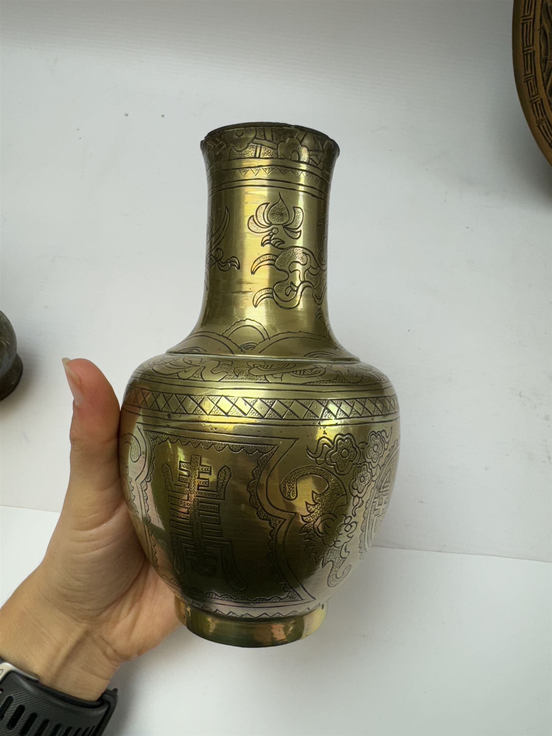 Pair of brass vases, together with brass charger and other metalware 