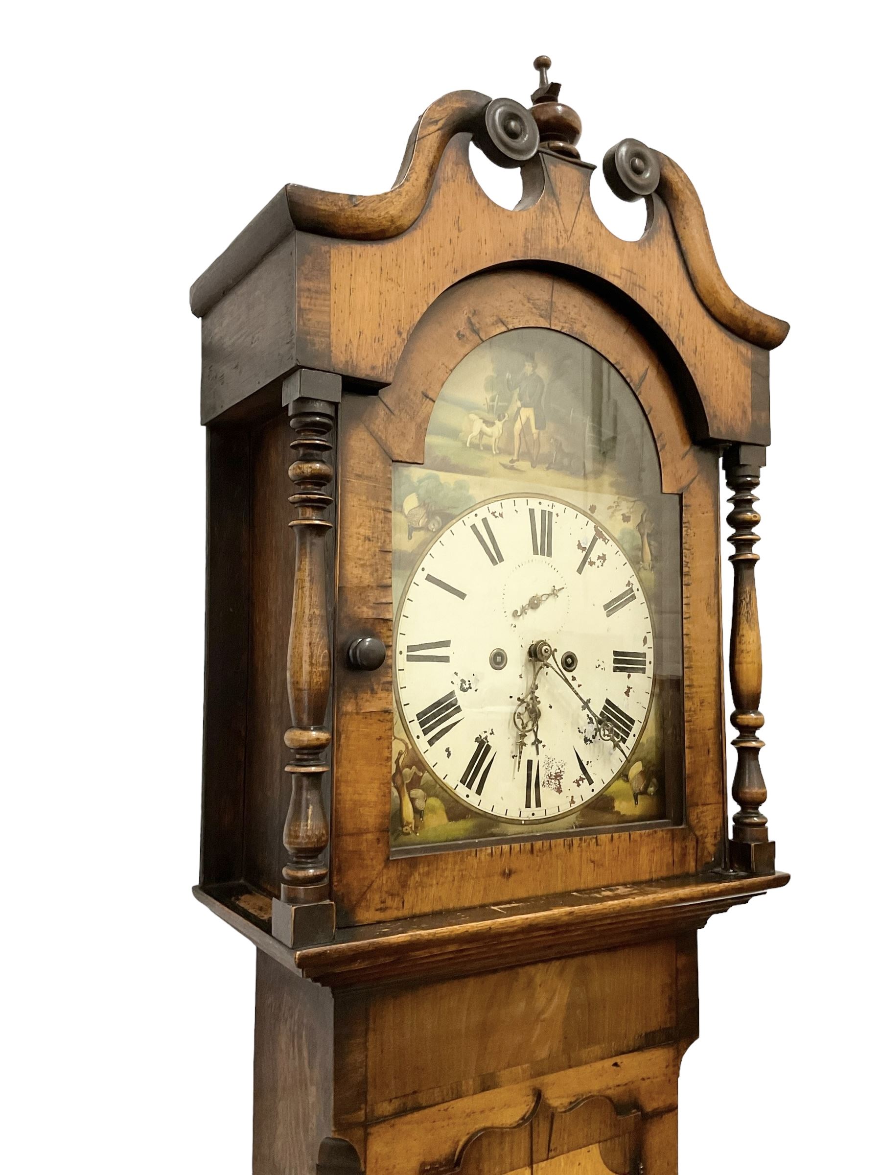 Late 19th century - oak and mahogany 8-day longcase clock, with a swan necked pediment, break arch hood door beneath flanked by ring turned pilasters, trunk with canted corners and a short wavy topped door, on a reduced plinth with no feet, painted dial with a depiction of a huntsman to the arch and game to the spandrels, with brass hands, Roman numerals and matching seconds and date dials, dial pinned directly to a rack striking movement, striking the hours on a bell. With pendulum and two weighs 