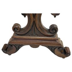 Early 19th century mahogany work table, moulded rectangular to over single cock-beaded drawer, on shaped end supports carved with C-scrolls and swirled roundel, united by turned stretcher, on C-scroll feet with brass castors