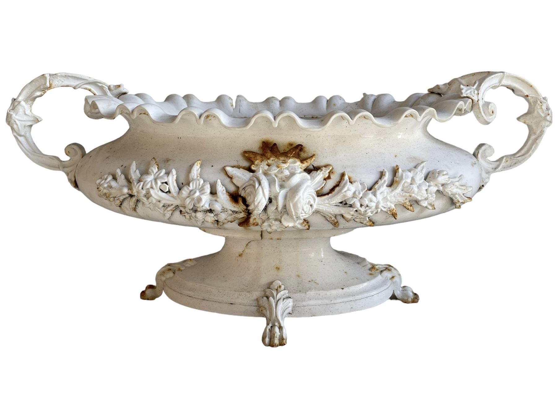 Corneau Alfred á Charleville - mid-19th century French cast iron planter, swollen and waisted oval form with scalloped upper rim, scrolled and ivy leaf cast handles, the front mounted by extending floral casting, on oval footed base with foliage and paw cast feet, the interior with drainage holes, inscribed 'Corneau Alfred á Charleville No 3' 