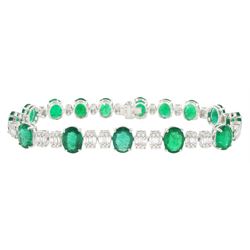 18ct white gold emerald and diamond bracelet, fifteen oval cut emeralds, spaced by cluster...