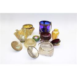 Collection of Austrian Art Nouveau iridescent glassware and similar, including handkerchief vase with pearlescent lustre, lidded pot with scrolling shell feet and finial, Kralik pearlescent jar with silver plated cover and handle, and other similar examples, tallest H14cm