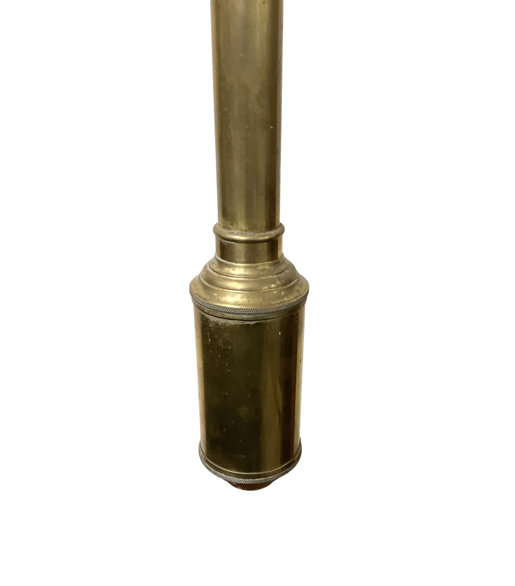 20th century - Cylindrical brass marine gimbal mounted ships barometer, fully enclosed glass tube and cistern,  engraved register indicating air pressure from 26 to 31 inches with predictions and adjustable recording vernier. With mercury.