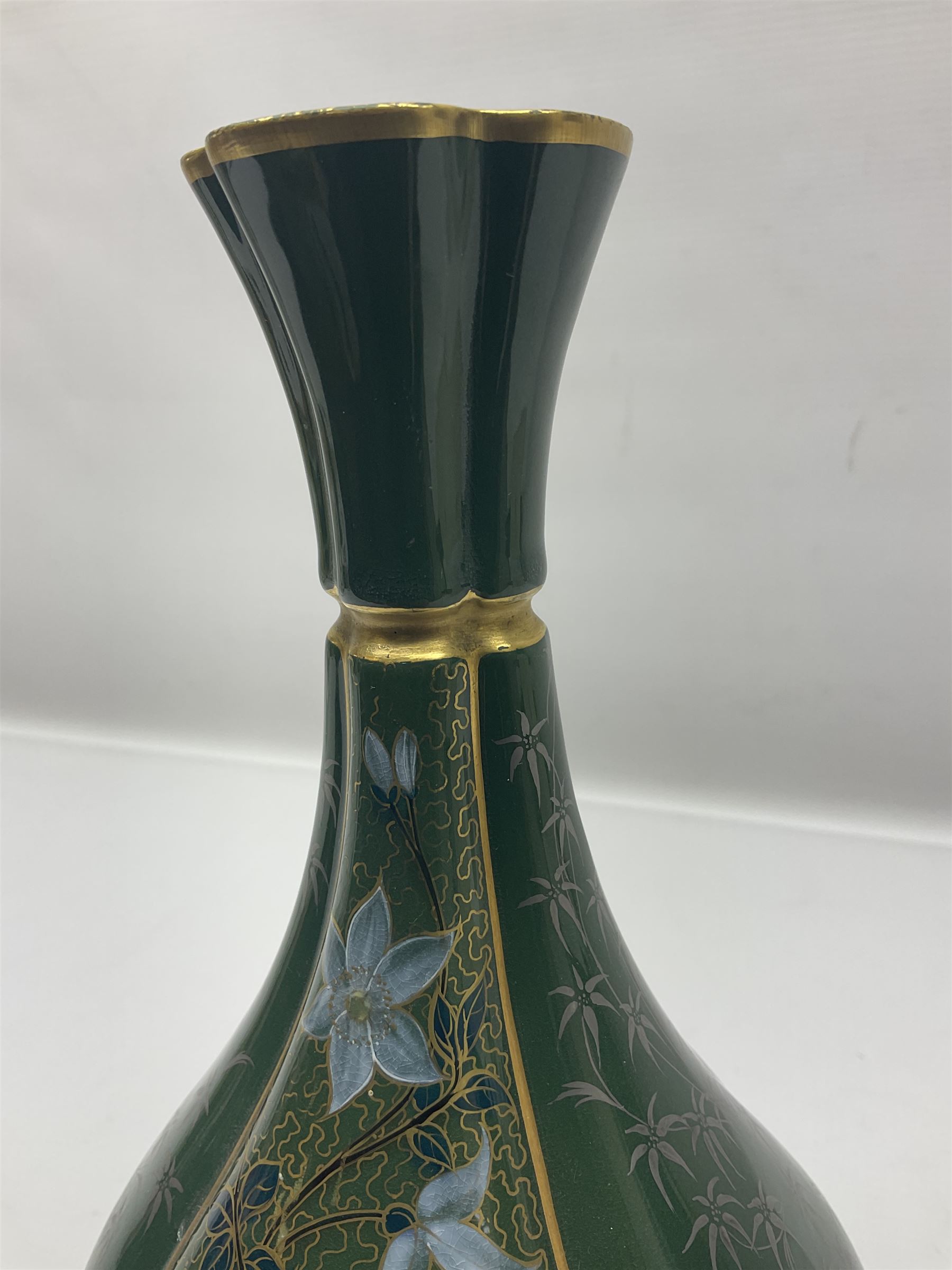 Royal Worcester vase of baluster form with floral decoration on a green ground H26cm