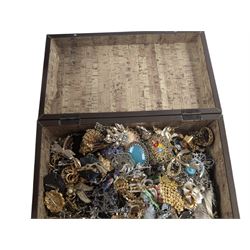 Collection of costume brooches, including ceramic, novelty and animal examples, contained within an Angel jewellery box