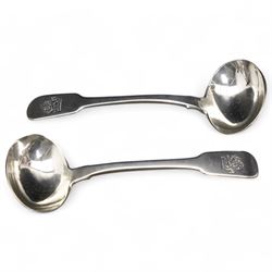 Pair of early Victorian provincial silver fiddle pattern sauce ladles engraved with a cres...