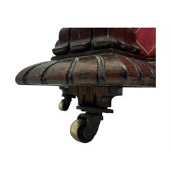 19th century rosewood and simulated rosewood ottoman footstool, tapering canted rectangular form enclosed by hinged lid, upholstered in red fabric, the frieze decorated with scrolling leaves, each corner with scrolled acanthus leaf supports, projecting shallow gadroon moulded edge 