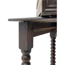 18th century oak side table, ovolo-moulded rectangular two plank top over single drawer with applied mouldings, on bobbin turned supports joined by stretchers, pegged construction, pressed putti mask handle plates and drop handles 