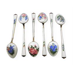 Set of six Norwegian silver-gilt and enamel demitasse spoons, decorated front and verso with small colourful flowers on a white ground,  925S Sterling, in retailers box for Magnus Aase, Bergen