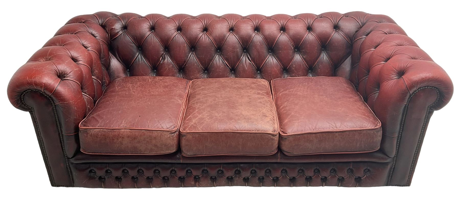 Chesterfield three-seat sofa upholstered in red buttoned leather