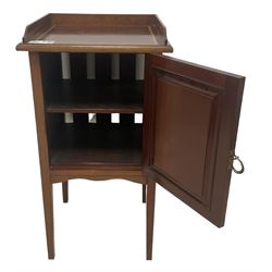 Edwardian inlaid mahogany pot cupboard, raised three-quarter gallery back, panelled door with fan inlay enclosing single shelf