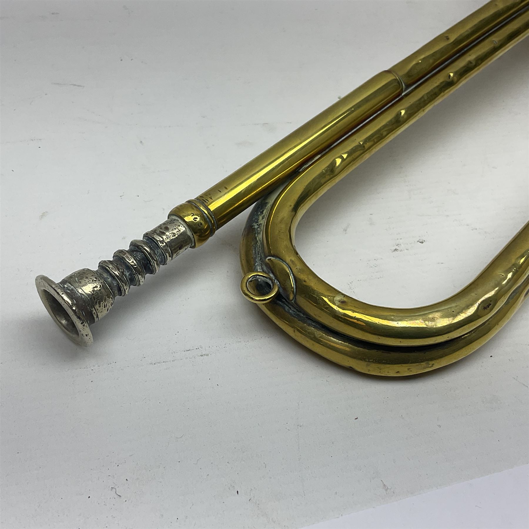 WWI Boosey & Co. brass military bugle, stamped 1916, together with Death of the Duke of Wellington, 1852, white metal medal by Allen & Moore, bugle L43cm