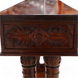 Neoclassical design mahogany console table, rectangular top over Greek key carved frieze with foliate carved back and sides, raised on twin pilaster end supports with acanthus capitals, on a plinth base