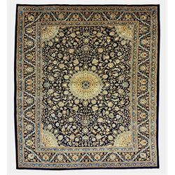 North East Persian Meshed indigo ground carpet, the central floral medallion surrounded by...